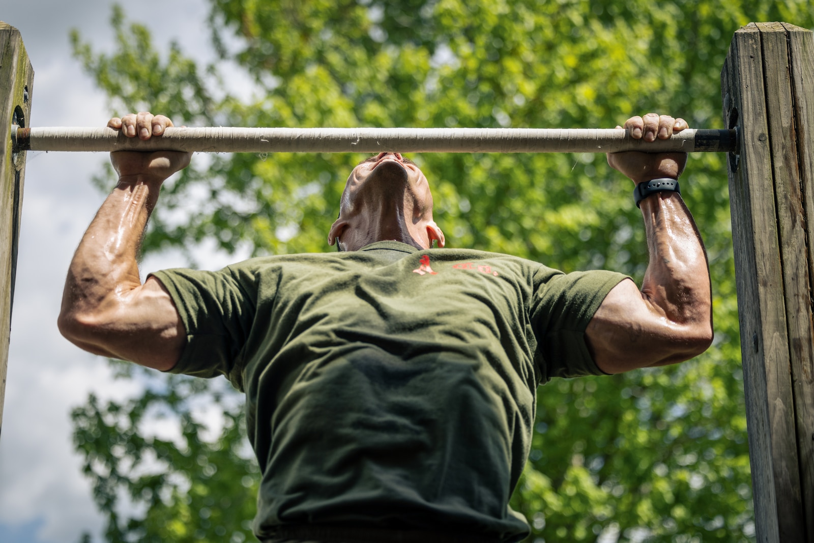 U.S. Marine Corps 1st Sgt. James Waddington, a Toledo, Ohio native and company first sergeant with Air Control Training Squadron, conducts a pull-up while competing in the Double-up competition during the 2024 Fittest Instructor Competition on Marine Corps Base Quantico, Virginia, April 24, 2024. The Fittest Instructor competition brings Marines from different units together to compete in a variety of events to include, a blind ruck march, a swimming competition, strength and endurance exercises, a Royal Marine physical fitness test, a modified biathlon, and Kim’s double obstacle course. (U.S. Marine Corps Lance Cpl. Ethan Miller)