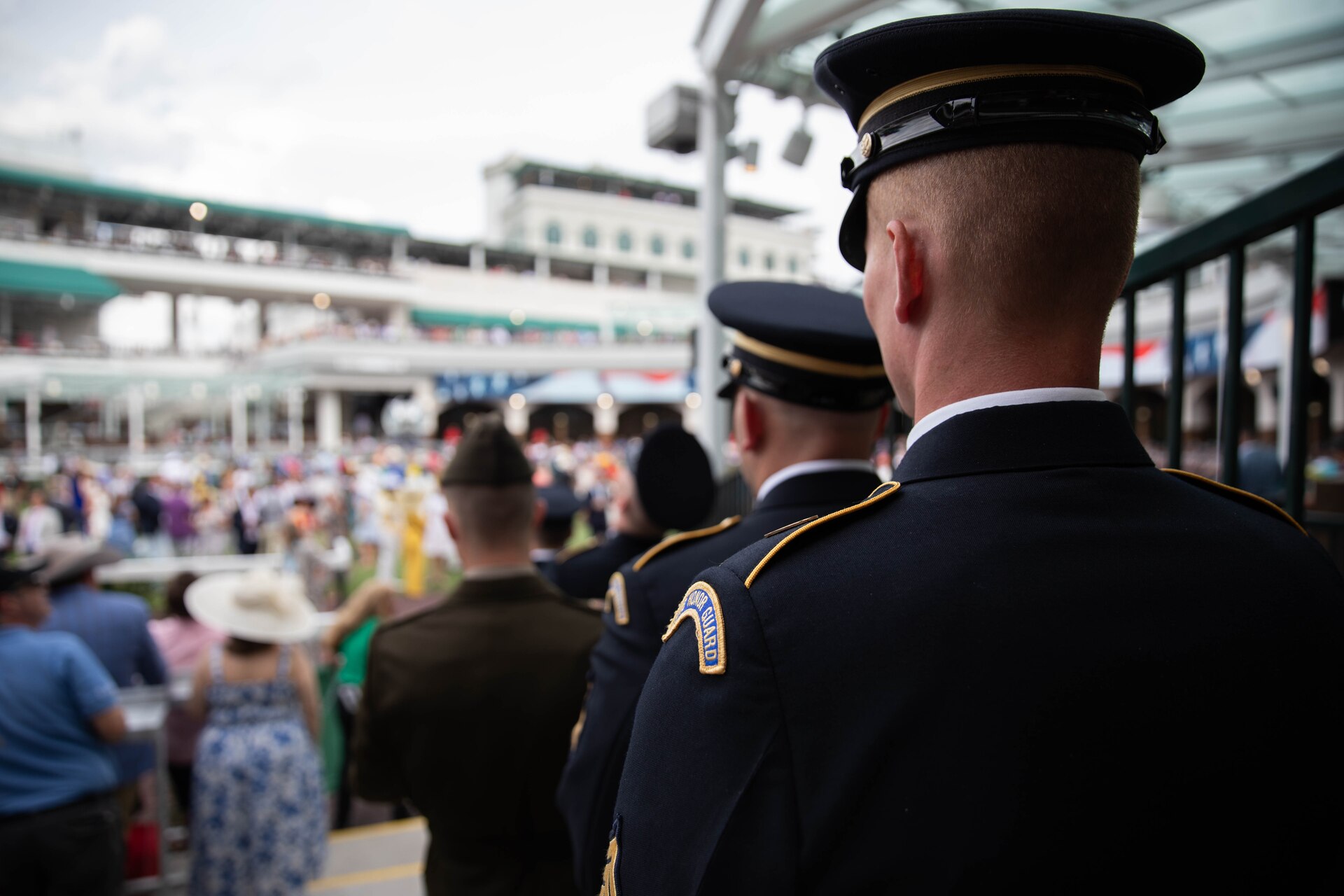 Soldiers of the 940th Military Police Company, 149th Maneuver Enhancement Brigade guard the winner’s trophy at the 150th Kentucky Derby at Churchill Downs, Louisville, Kentucky, May 4, 2024. The Kentucky Army National Guard carries a long tradition of escorting the winner’s cup dating back decades. (U.S. Army National Guard photo by Sergeant Caleb Sooter)