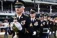 Soldiers of the 940th Military Police Company, 149th Maneuver Enhancement Brigade guard the winner’s trophy at the 150th Kentucky Derby at Churchill Downs, Louisville, Kentucky, May 4, 2024. The Kentucky Army National Guard carries a long tradition of escorting the winner’s cup dating back decades. (U.S. Army National Guard photo by Sgt. Caleb Sooter)