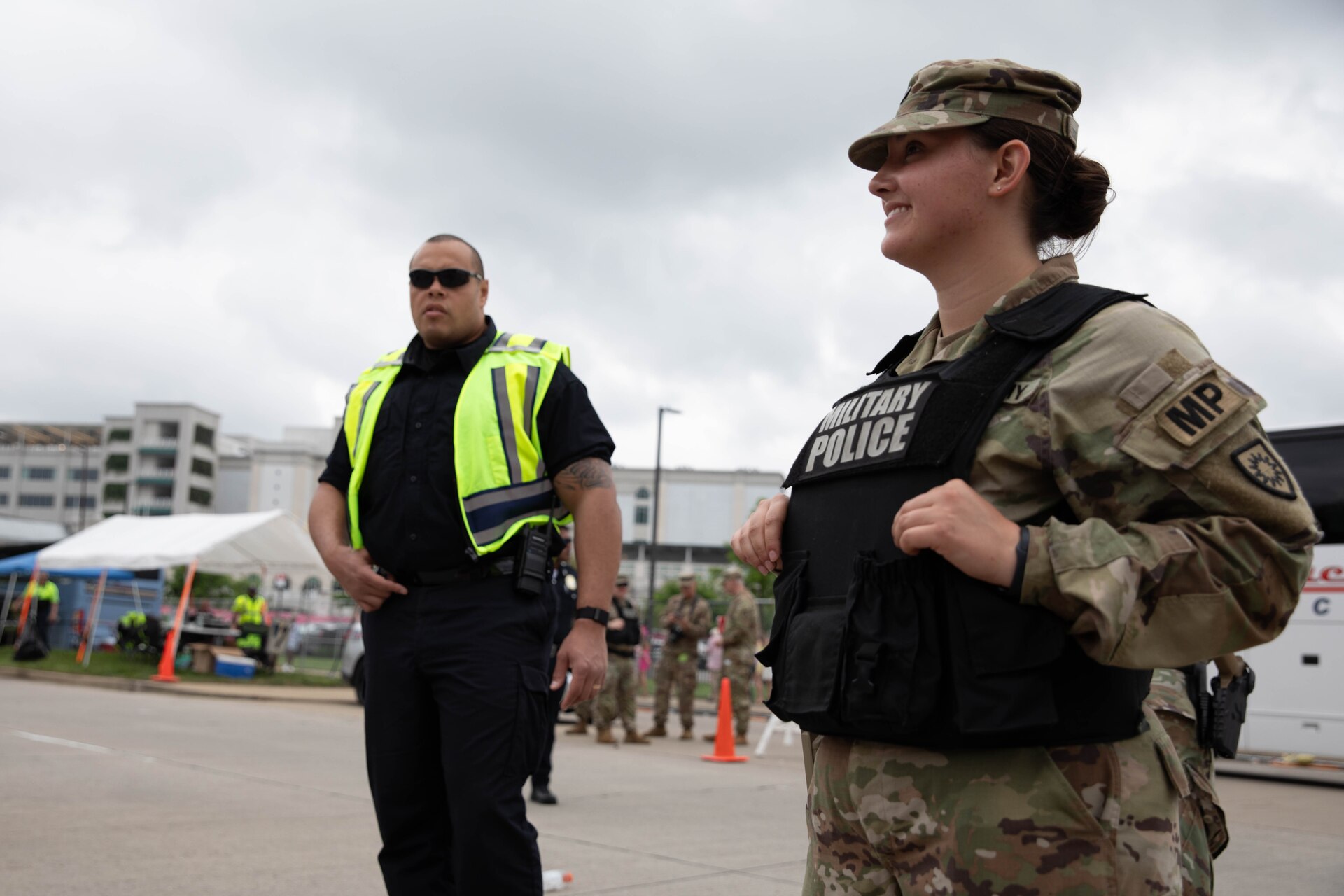Soldiers of the 149th Maneuver Enhancement Brigade augment Louisville Metro Police Department officers in support of the 150th Kentucky Derby at Churchill Downs, Louisville, Kentucky, May 4, 2024. The Kentucky National guard has been assisting local police with traffic control and public safety during Derby season every year for the past 118 years. (U.S. Army National Guard photo by Sergeant Caleb Sooter)