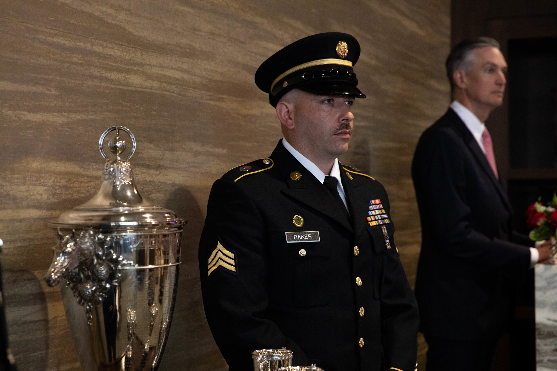 Soldiers of the 940th Military Police Company, 149th Maneuver Enhancement Brigade guard the winner’s trophy at the 150th Kentucky Derby at Churchill Downs, Louisville, Kentucky, May 4, 2024. The Kentucky Army National Guard carries a long tradition of escorting the winner’s cup dating back decades. (U.S. Army National Guard photo by Sergeant Caleb Sooter)