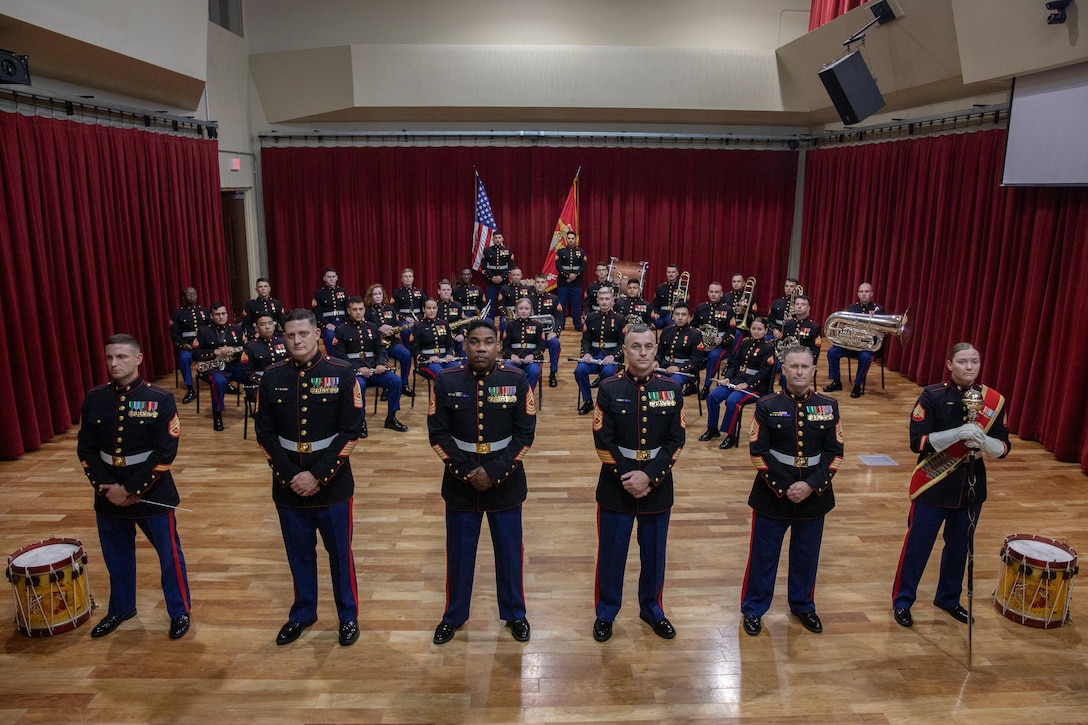 U.S. Marines assigned to the Marine Forces Reserve Band pose for a group photo at the Marine Corps Support Facility New Orleans, April 2, 2024. Band members will be conducting a Spring Tour throughout Texas and also will be visiting local high school bands to demonstrate the many musical roles available in the Marine Corps. (U.S. Marine Corps photo by Lance Cpl. Casey Cooper)