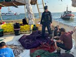 Coast Guard Cutter Hawk law enforcement crew members conduct fisheries boardings on vessels off the coast of Texas, in April 2024. Fishery boardings are conducted to ensure commercial fisheries are following federal laws and regulations on the water. (U.S. Coast Guard Photo Courtesy Coast Guard Cutter Hawk)