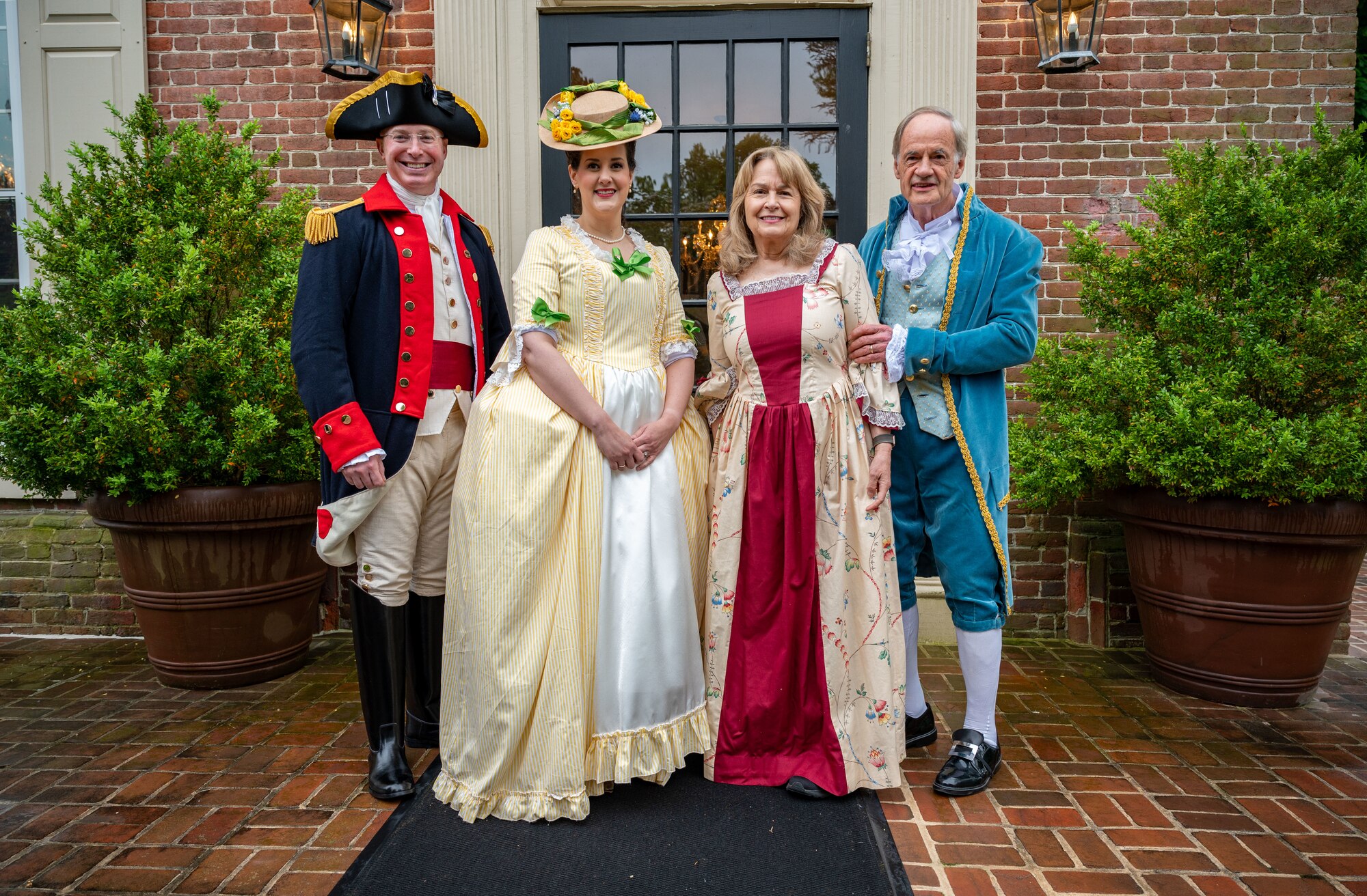 From the left, U.S. Air Force Col. Chris McDonald, 436th Airlift Wing commander, his wife, Diana McDonald, Martha Carper and U.S. Sen. Tom Carper pose for a photo in front of Woodburn, the governor’s residence, in Dover, Delaware, May 4, 2024. The McDonald’s and Carper’s participated in the 91st Annual Dover Days Festival and Parade, an event that highlights the First State’s history and heritage. (U.S. Air Force photo by Airman 1st Class Amanda Jett)