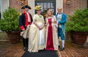 From the left, U.S. Air Force Col. Chris McDonald, 436th Airlift Wing commander, his wife, Diana McDonald, Martha Carper and U.S. Sen. Tom Carper pose for a photo in front of Woodburn, the governor’s residence, in Dover, Delaware, May 4, 2024. The McDonald’s and Carper’s participated in the 91st Annual Dover Days Festival and Parade, an event that highlights the First State’s history and heritage. (U.S. Air Force photo by Airman 1st Class Amanda Jett)
