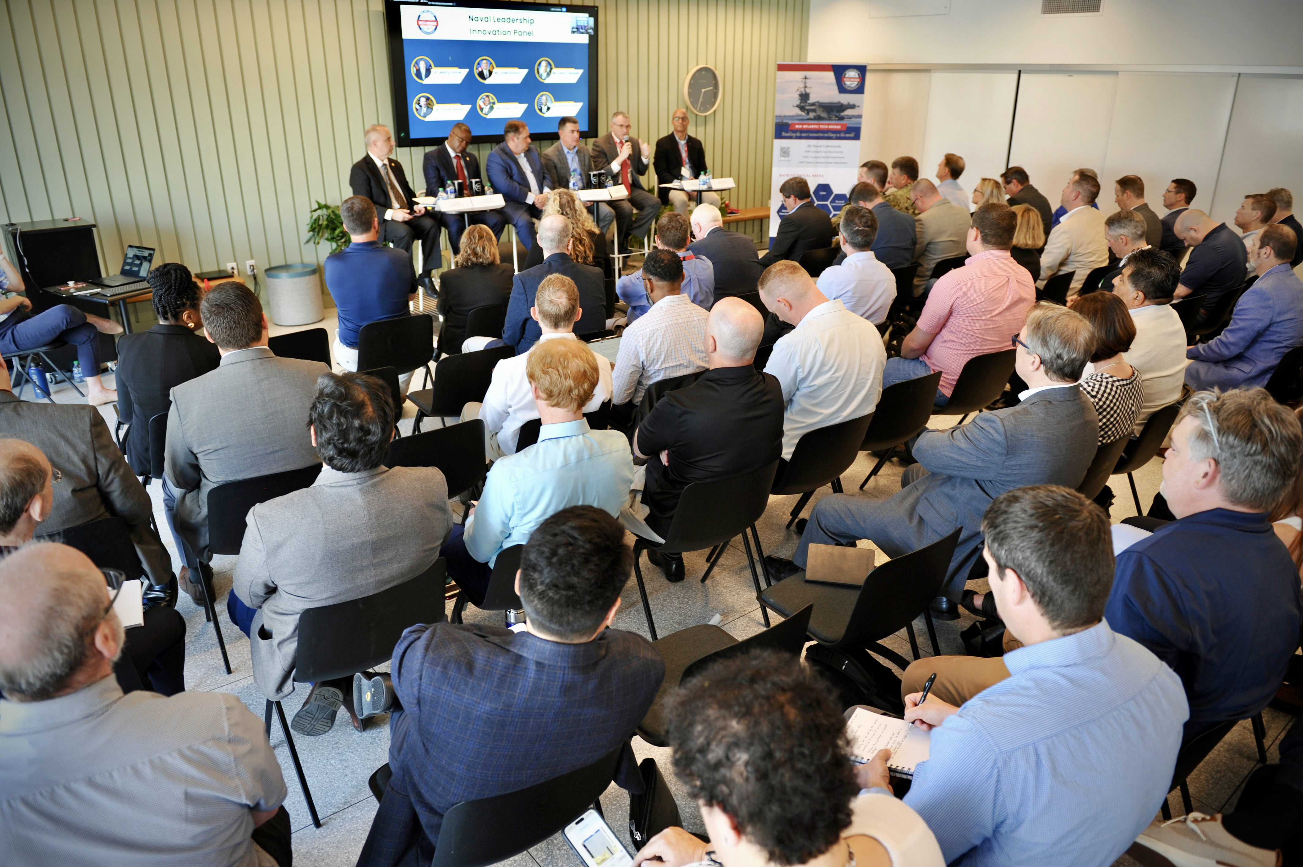 NIWC Atlantic Executive Director Peter C. Reddy speaks alongside other senior naval leaders during the NavalX Mid-Atlantic Tech Bridge (MATB)’s Naval Leadership Innovation Panel event in Norfolk on May 1.
