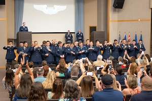 Twenty-seven U.S. Air Force officers were awarded silver wings during the ceremony, symbolizing their completion of the Undergraduate Pilot Training program.