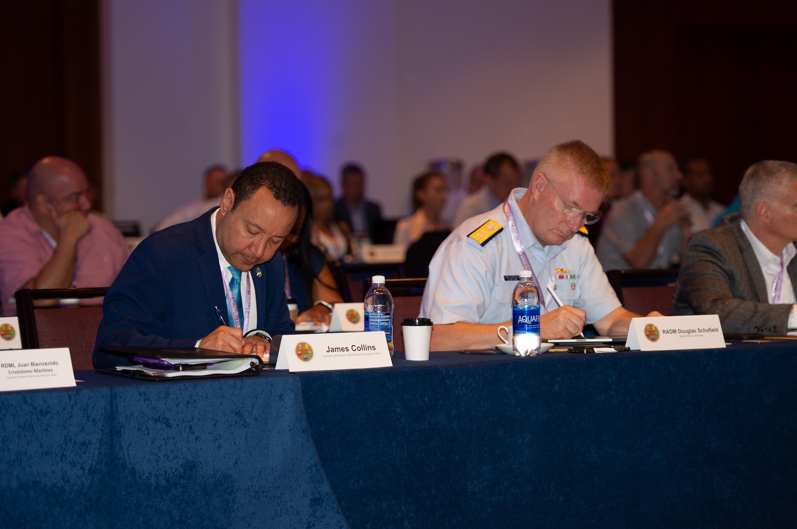 The U.S. Customs and Border Protection Office of International Affairs Assistant Commissioner James Collins, left, and the U.S. Coast Guard Seventh District Commander Rear Adm. Douglas Schofield, right, participate in the Eastern Caribbean Combined Coordination Group (ECCG) meeting April 23-25, in San Juan, Puerto Rico. The ECCG is comprised of U.S. interagency and international partners with diverse expertise and authorities necessary to deepen cooperation across myriad jurisdictions and against a broad spectrum of threats and challenges in Eastern Caribbean region.
