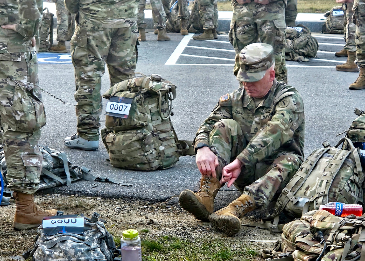 Master Sgt. Kenneth Boff of Joint Force Headquarters, New Hampshire Army National Guard, prepares for the start of the 18.6-mile Norwegian Foot March on May 4, 2024, in Concord, N.H.