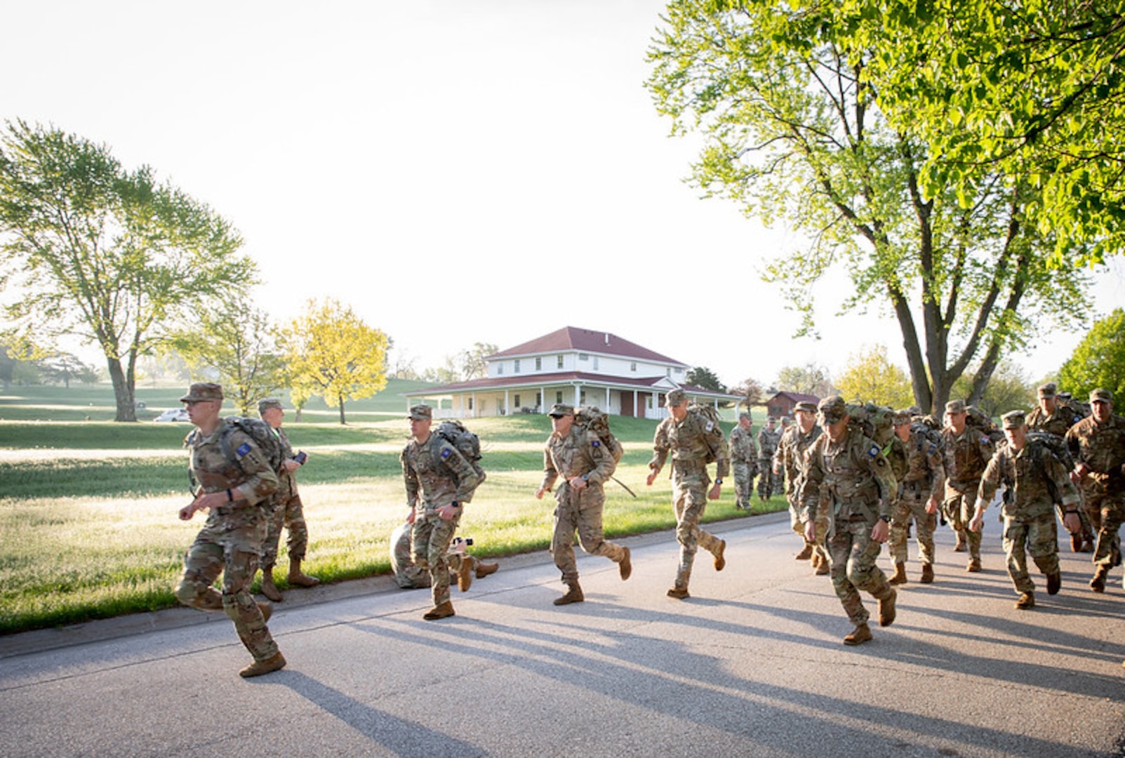 Spc. Tevin Kenton, from the Wisconsin Army National Guard’s Troop C, 1st Squadron, 105th Cavalry Regiment, leads the pack during a 12-mile ruck march May 5, the concluding event in the 2024 Region IV Best Warrior Competition at Camp Dodge, Iowa. Kenton took first place in the lower enlisted division and will represent Wisconsin at the national Best Warrior Competition this August in Vermont. 135th Mobile Public Affairs Detachment photo by Staff Sgt. Samantha Hircock