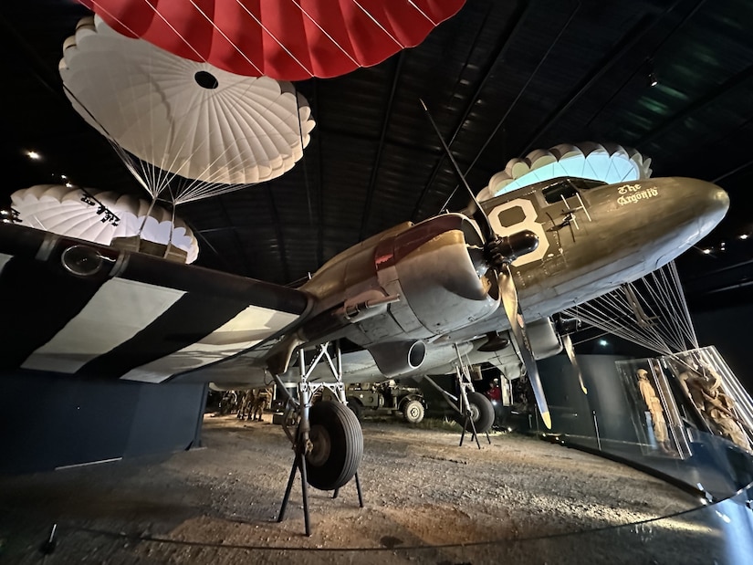 An airplane is on display in a museum.