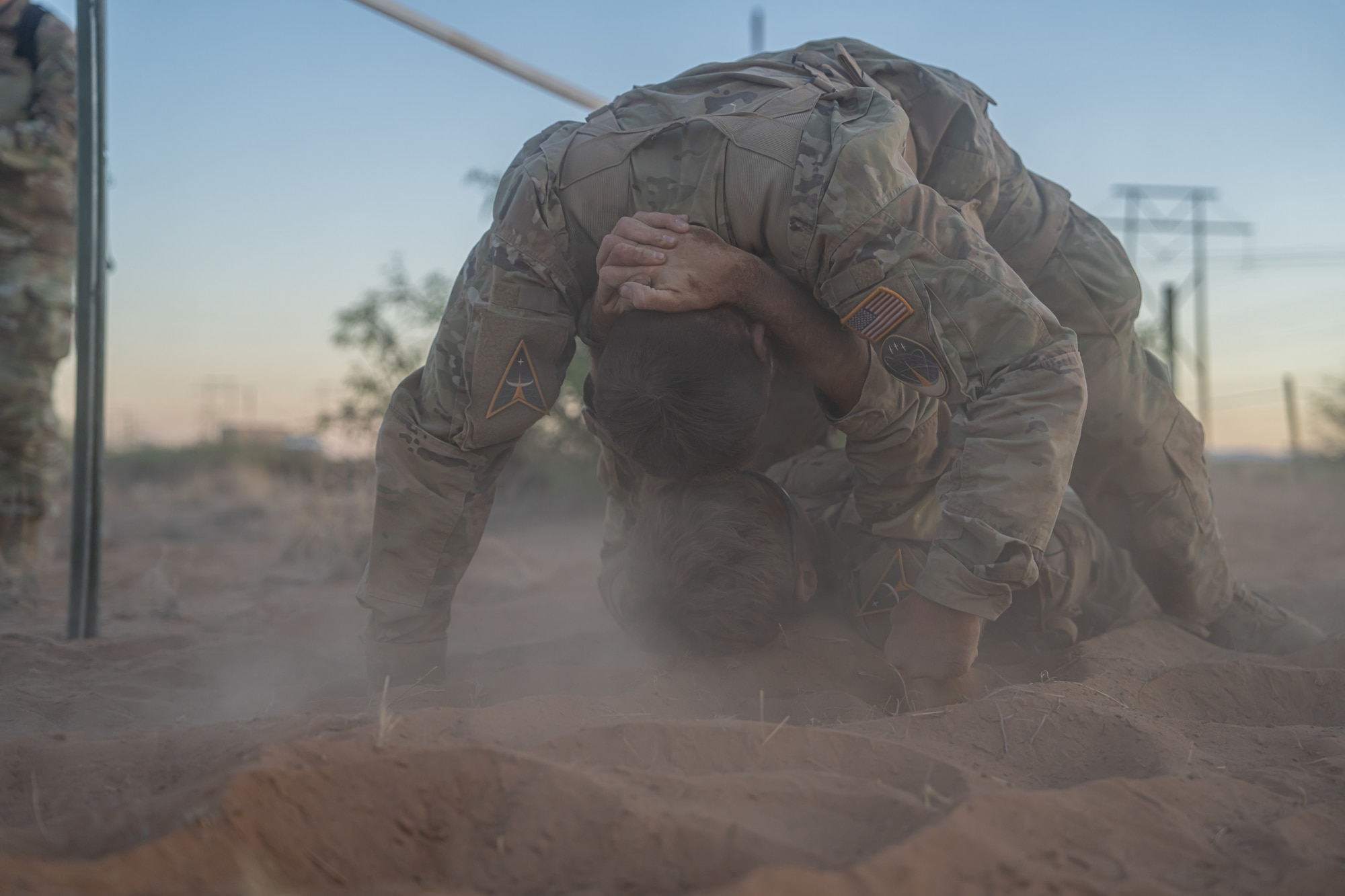 U.S. Space Force spur ride candidates conduct a buddy bear crawl during a spur ride.