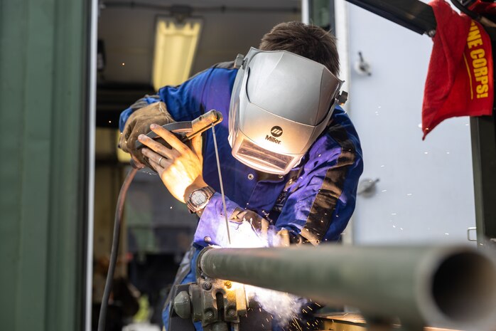 U.S. Marine Corps Pfc. Steven Rosche, a machinist with 3rd Maintenance Battalion, 3rd Marine Logistics Group, welds a pipe together during a Marine Corps Combat Readiness Evaluation (MCCRE) at Camp Schwab, Japan, April 18, 2024. Rosche is a native of New York. The purpose of a MCCRE is to formally evaluate the unit’s core assigned tasks in order to ensure unit standardization and combat readiness. (U.S. Marine Corps photo by Sgt. Christian M. Garcia)