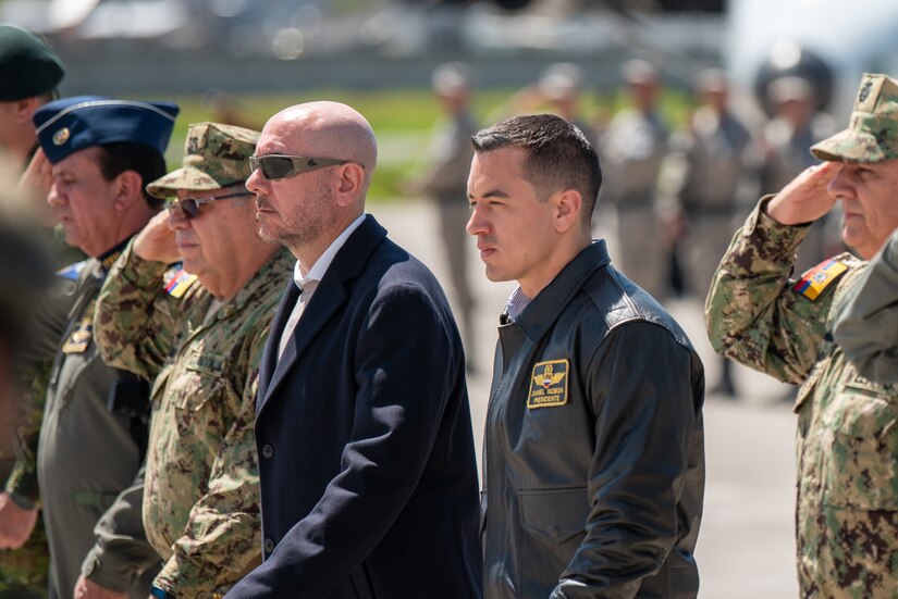 Ecuador President Daniel Noboa, right, and Giancarlo Loffredo, Ecuadorian minister of defense, attend a ceremony welcoming the arrival of a C-130H Hercules to the Ecuadorian Air Force in Latacunga, Ecuador, March 25, 2024. The ceremony marked a new milestone in Ecuador’s participation in the National Guard Bureau State Partnership Program, which has paired Ecuador and the Kentucky National Guard for mutual military cooperation. (U.S. Air National Guard photo by Phil Speck)