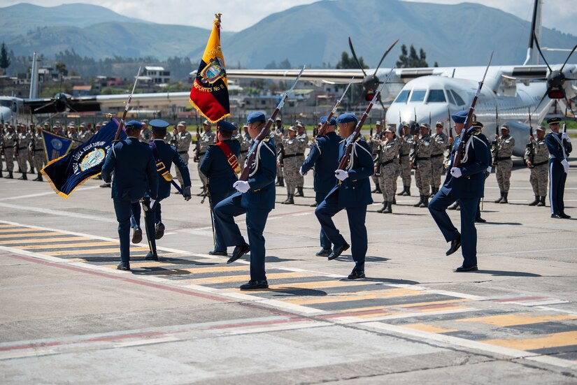 A color guard from the Ecuadorian Armed Forces opens a ceremony welcoming the arrival of a C-130H Hercules to the Ecuadorian Air Force in Latacunga, Ecuador, March 25, 2024. The ceremony, which included top Ecuadorian military and civilian leaders, marked a new milestone in Ecuador’s participation in the National Guard Bureau State Partnership Program, which has paired Ecuador and the Kentucky National Guard for mutual military cooperation. (U.S. Air National Guard photo by Phil Speck)