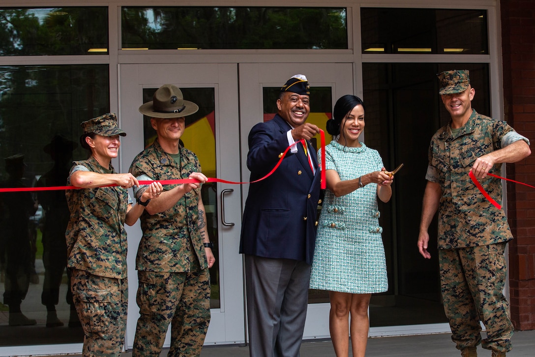 Currently occupied for the U.S. Marines and recruits of Romeo Company, Support Battalion, Recruit Training Regiment, the installation was formally dedicated to the late retired U.S. Marine, Sgt. Maj. Louis Roundtree on April 19, 2023 by Brig. Gen. Walker M. Field, commanding general of Marine Corps Recruit Depot Parris Island, S.C. and the Eastern Recruiting Region, and Sgt. Maj. Sael Garcia, sergeant major of Marine Corps Recruit Depot Parris Island and the Eastern Recruiting Region. 



Following the dedication ceremony, members of the Montford Point Marine Association and guests were able to view various displays dedicated to Sgt. Maj. Roundtree and the Montford Point Marines throughout Roundtree Hall and the Parris Island Museum on the depot. 



(U.S. Marine Corps photo by Cpl. Jacqueline Kliewer)