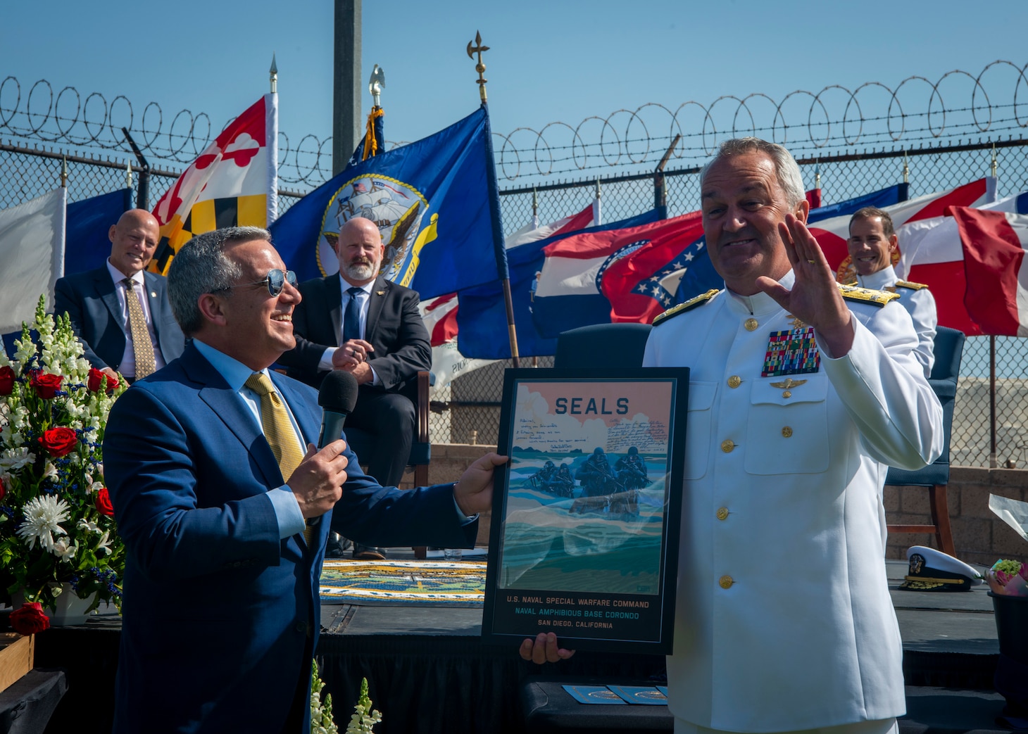 Vice Adm. Collin Green, Deputy Commander of U.S. Special Operations Command, is presented a gift during his retirement ceremony at Naval Special Warfare Command.