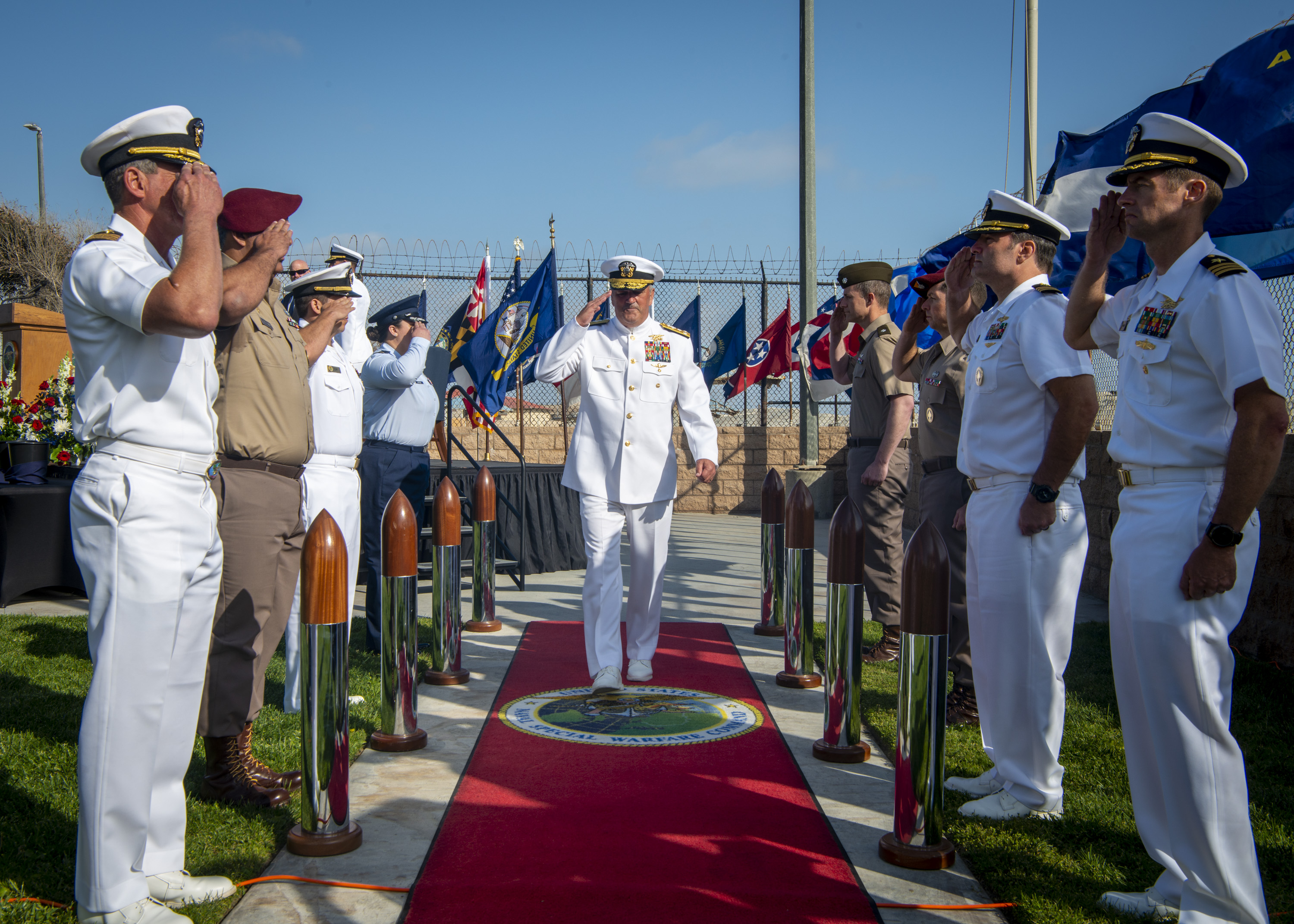 Vice Adm. Collin Green, Deputy Commander of U.S. Special Operations Command, is piped ashore, for the last time, during his retirement ceremony at Naval Special Warfare Command.