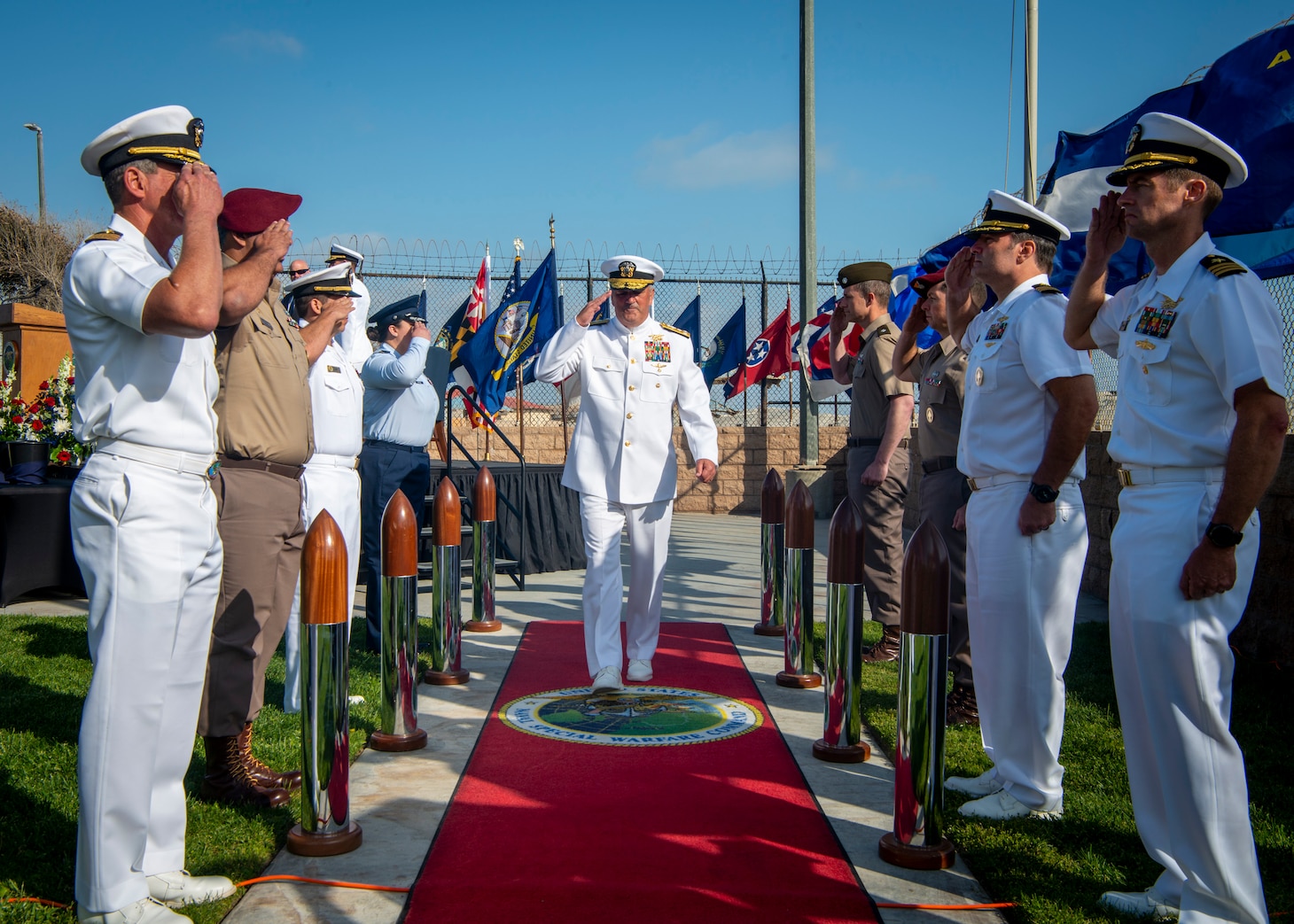 Vice Adm. Collin Green, Deputy Commander of U.S. Special Operations Command, is piped ashore, for the last time, during his retirement ceremony at Naval Special Warfare Command.