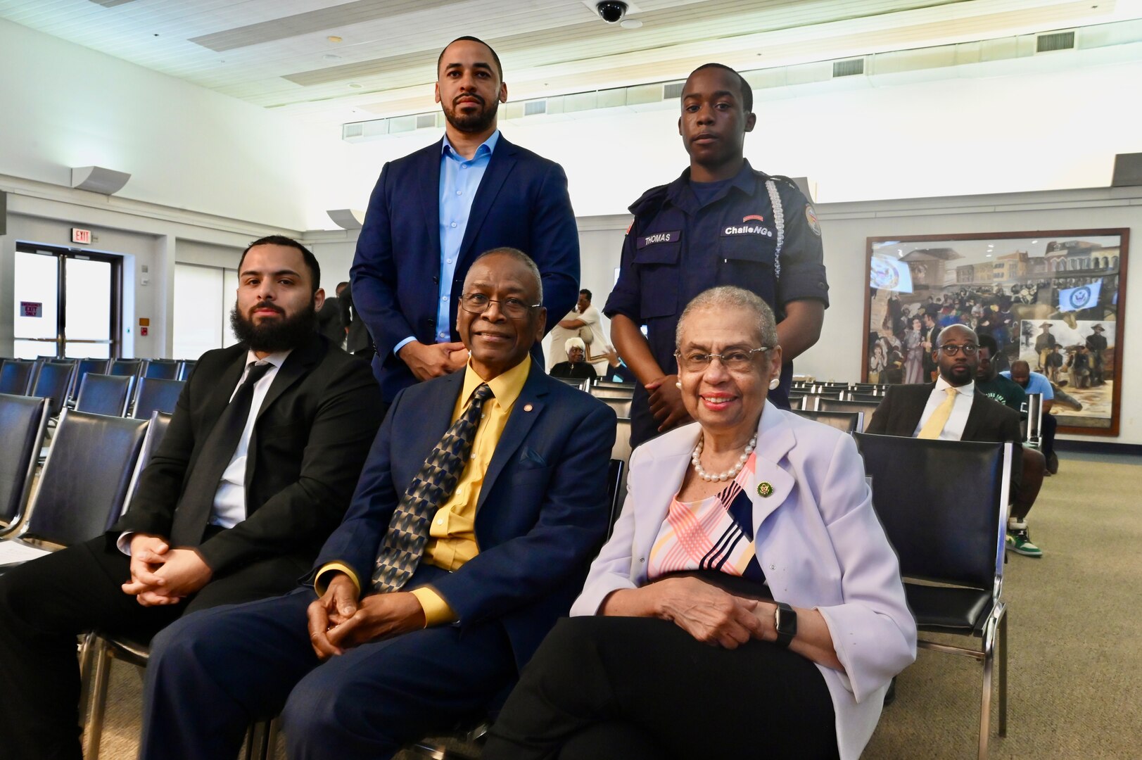 Representatives from the Capital Guardian Youth ChalleNGe Academy, D.C. Commission on Black Men and Boys, and Rep. Eleanor Holmes Norton are photographed prior to a meeting in Washington, D.C, April 30, 2024. The commission seeks solutions to disparities affecting Black men and boys in the District to include social conditions, crime and incarceration rates.