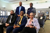 Representatives from the Capital Guardian Youth ChalleNGe Academy, D.C. Commission on Black Men and Boys, and Rep. Eleanor Holmes Norton are photographed prior to a meeting in Washington, D.C, April 30, 2024. The commission seeks solutions to disparities affecting Black men and boys in the District to include social conditions, crime and incarceration rates.