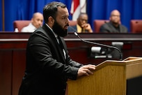 Hector Lamas, assistant lead recruiter, Capital Guardian Youth ChalleNGe Academy, provides remarks during a D.C. Commission on Black Men and Boys meeting in Washington, D.C, April 30, 2024. The commission seeks solutions to disparities affecting Black men and boys in the District to include social conditions, crime and incarceration rates.