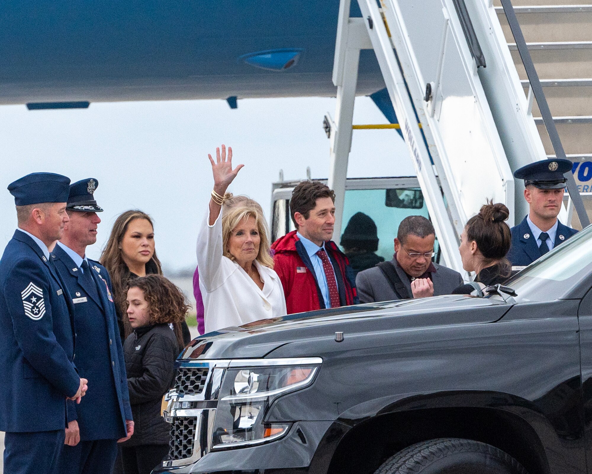 U.S. Air Force Col. Jesse Carlson and Command Chief Master Sgt. Richard Schumacher, 133rd Airlift Wing, greet First Lady Dr. Jill Biden in St. Paul, Minn., April 19, 2024.
