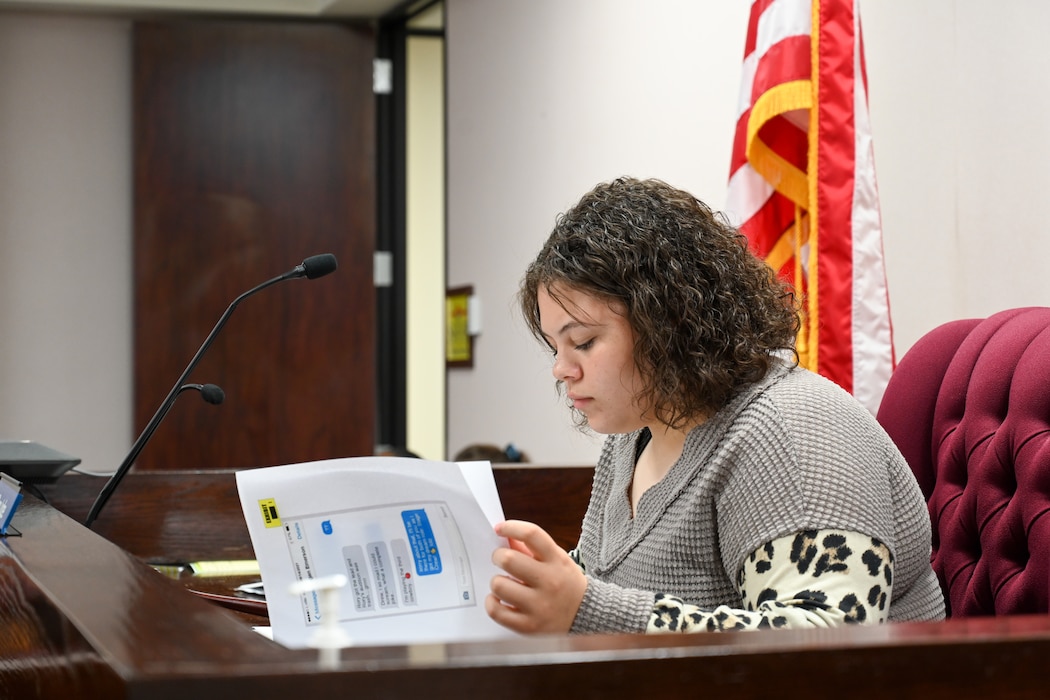 Aubrey Maldonado, Mangum High School student, portrays a judge at Altus Air Force Base, Oklahoma, May 1, 2024. The judge oversaw the trial and gave direction when needed. (U.S. Air Force photo by Airman Lauren Torres)