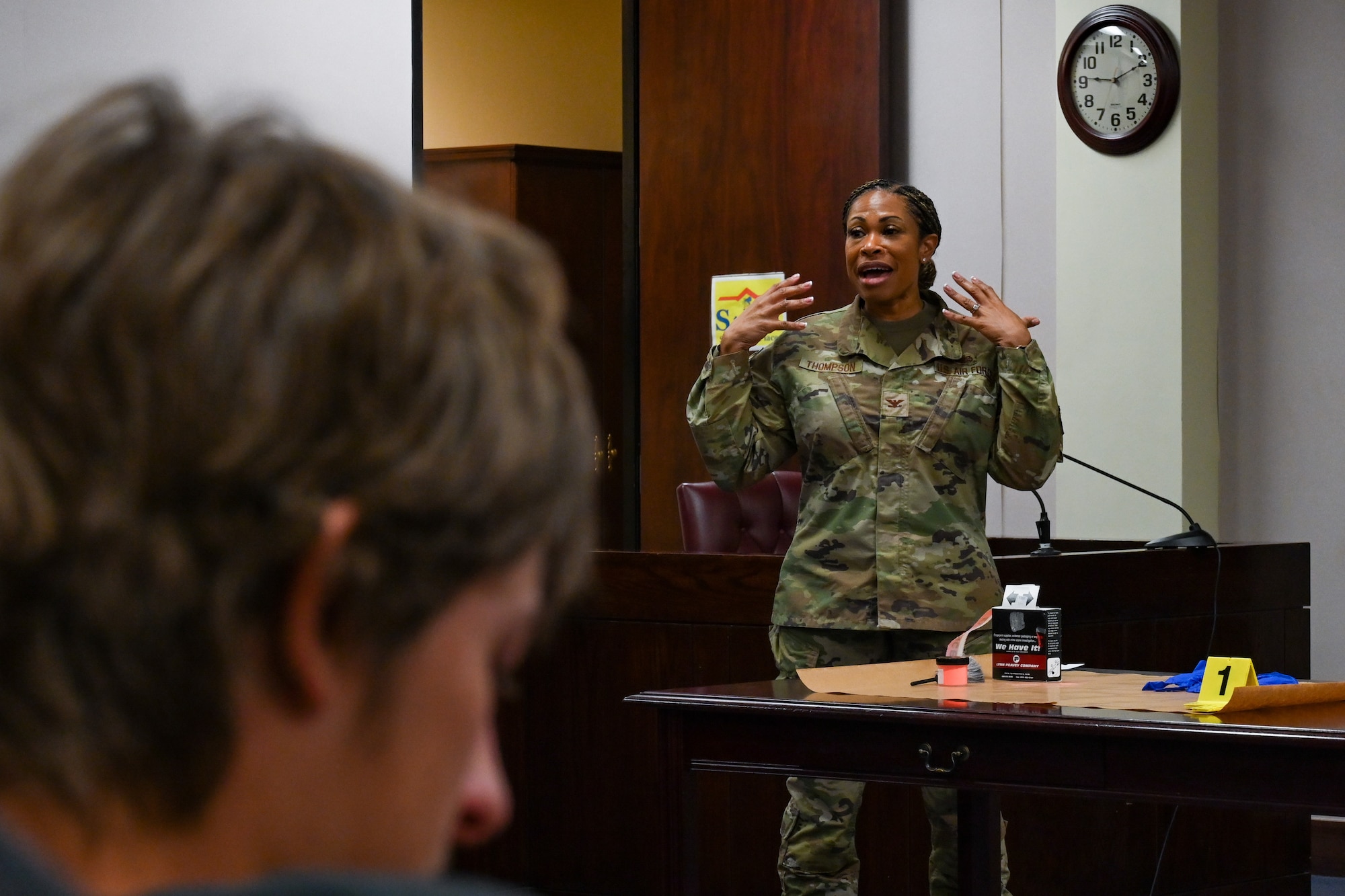 U.S. Air Force Col. Velma Thompson, 97th Air Mobility Wing staff judge advocate, talks to Mangum High School students at Altus Air Force Base, Oklahoma, May 1, 2024. Thompson explained the importance of Law Day to the students and gave insight into how the mock trial would go. (U.S. Air Force photo by Airman Lauren Torres)