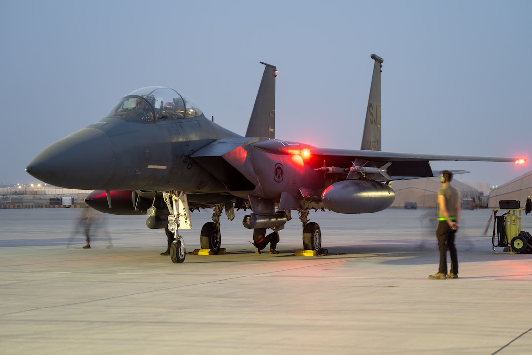 U.S Air Force F-15E Strike Eagles prepare to take off from an undisclosed location within the U.S. Central Command area of responsibility to participate in exercise Desert Flag 2024, hosted by a regional coalition partner, May 3, 2024. Desert Flag provides strategic training with multinational and regional partners to build upon a cohesive fighting force in the defense of the Arabian Peninsula. (U.S. Air Force Photo)