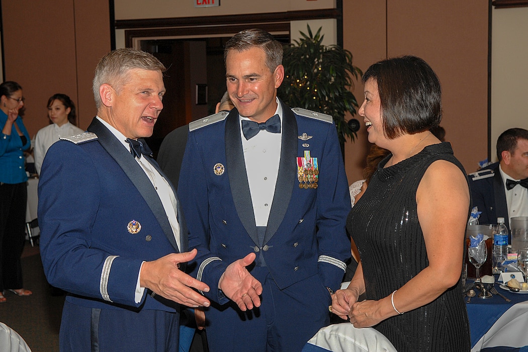 U.S Air Force retired Lt. Gen. Robert Elder (left), U.S. Air Force retired Maj. Gen. H. D. Polumbo and Janice Nall converse during the annual celebration of the Air Force birthday at the Recce Point Club on Beale Air Force Base, California, Sept. 21, 2007.