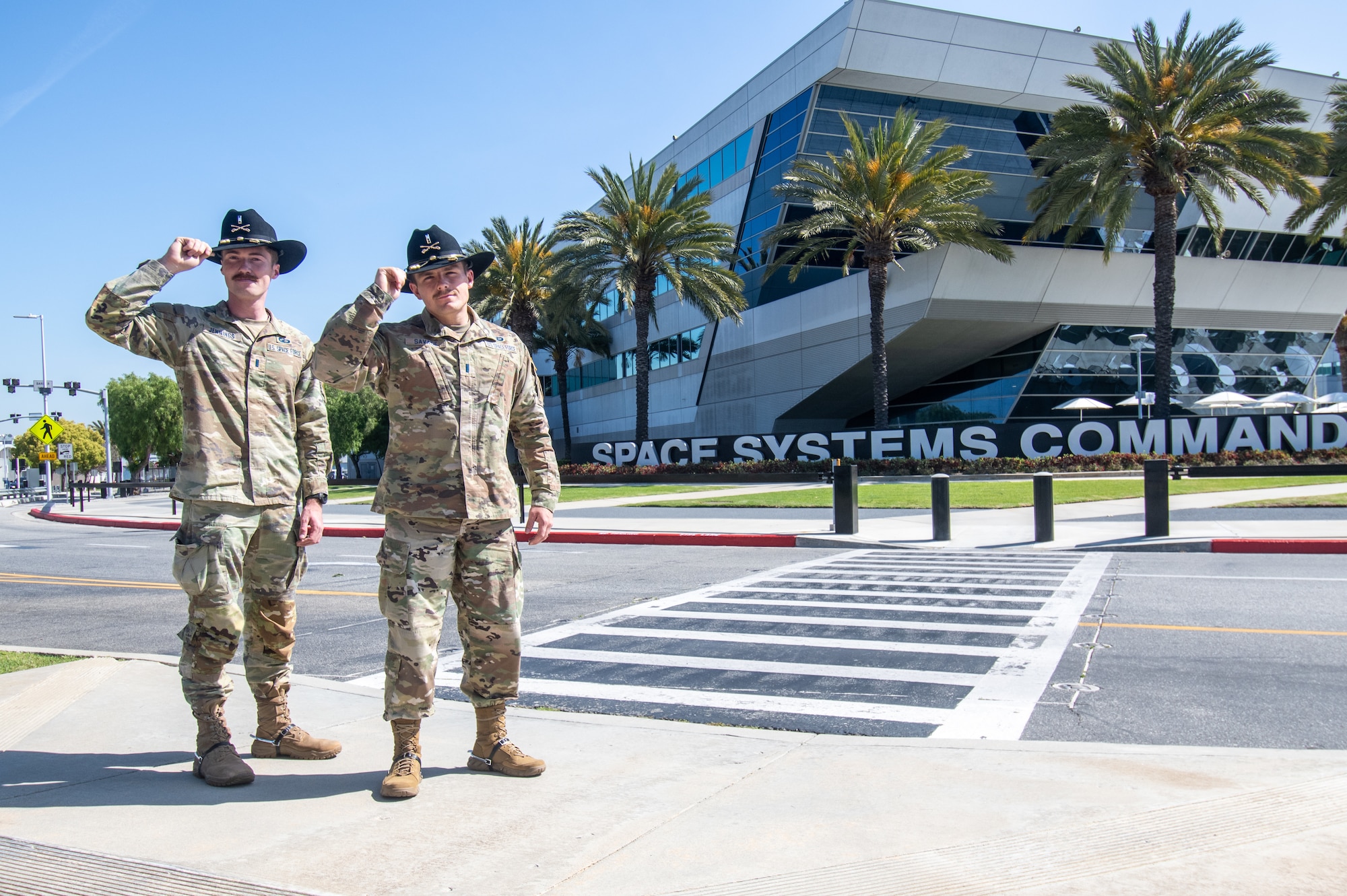 U.S. Space Force (USSF) First Lieutenants Jordan Savage and Jackson Jennings, from Space Systems Command’s Battle Management Command, Control, and Communications Program Executive Office (SSC/BMC3), doing a little yee-haw.