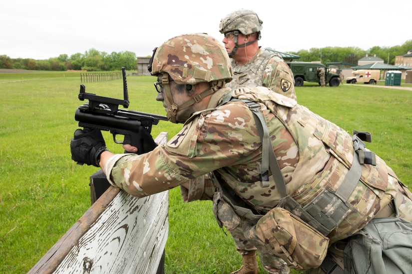 Spc. Tevin Kenton, from the Wisconsin Army National Guard’s Troop C, 1st Squadron, 105th Cavalry Regiment, fires an M-320 grenade launcher May 3 during the 2024 Region IV Best Warrior Competition at Camp Dodge, Iowa. Kenton took first place in the lower enlisted division and will represent Wisconsin at the national Best Warrior Competition this August in Vermont.