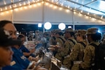 Military members in line for food
