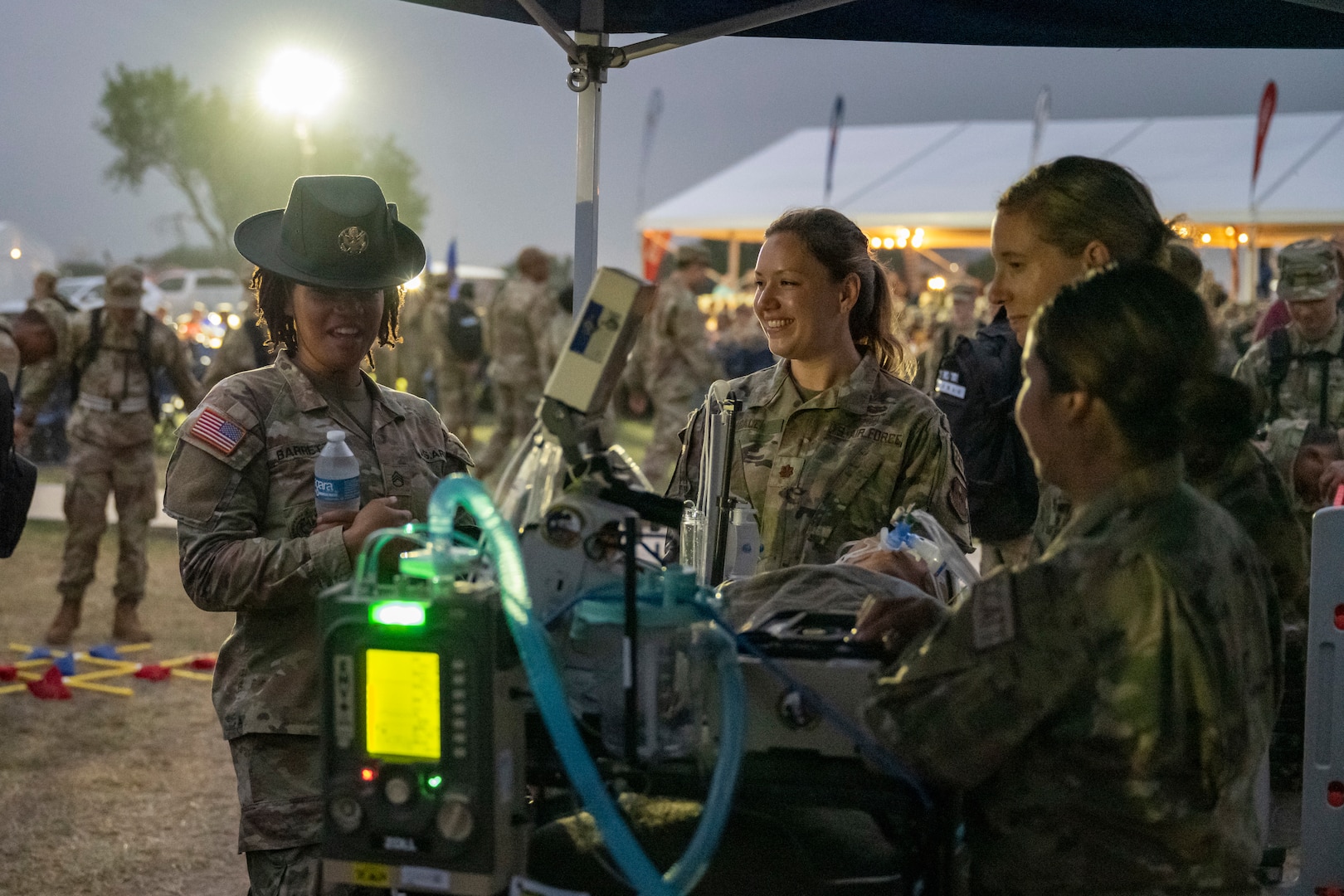 Military members around equipment