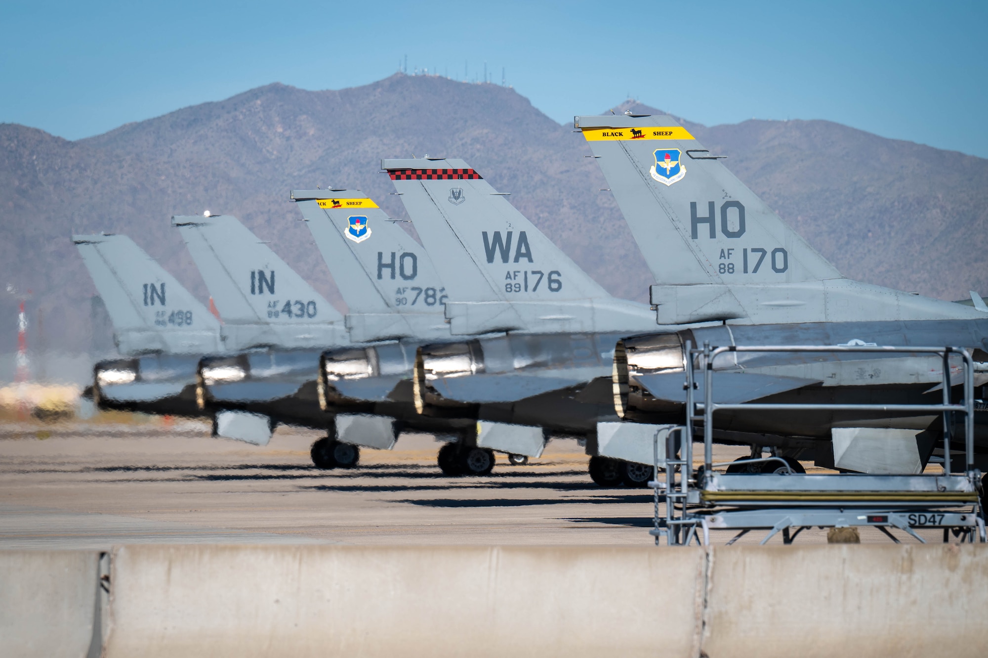 U.S. Air Force F-16 Fighting Falcon aircraft assigned to the 309th Fighter Squadron hold formation before takeoff, May 7, 2024, at Luke Air Force Base, Arizona.