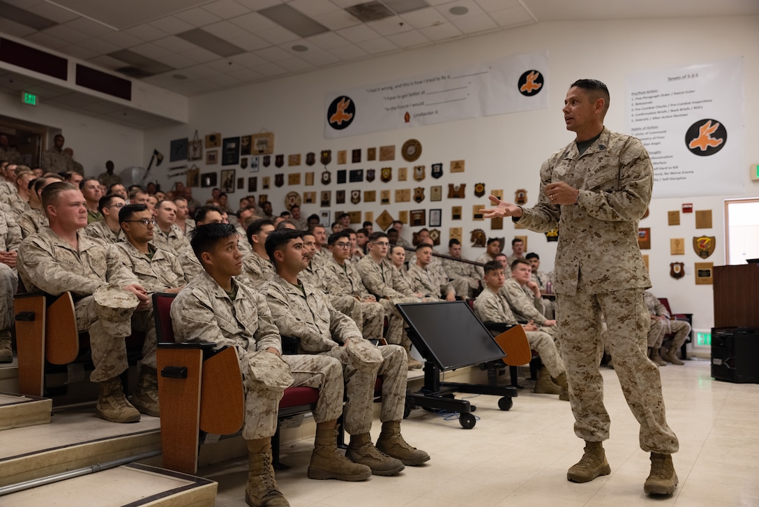 U.S. Marine Corps Sgt. Maj. Carlos Ruiz, a Sonora, Mexico native, sergeant major of the Marine Corps, speaks to Tactical Training and Exercise Control Group enlisted staff and personnel during an open discussion at Marine Corps Air-Ground Combat Center, Twentynine Palms, California, April 25, 2024. Ruiz visited TTECG to gain an understanding of who the Marines are, their mission, and how they help prepare Marines for deployments. (U.S. Marine Corps photo by Lance Cpl. Enge You)