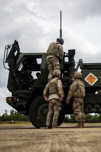 U.S. Soldiers with 3rd Platoon, Alpha Battery, 1st Long Range Fires Battalion, 1st Multi-Domain Task Force conduct a High Mobility Rocket System Rapid Infiltration drill during Exercise Balikatan 24 at San Vicente Airport, Philippines, May 1, 2024. BK 24 is an annual exercise between the Armed Forces of the Philippines and the U.S. military designed to strengthen bilateral interoperability, capabilities, trust, and cooperation built over decades of shared experiences. (U.S. Marine Corps photo by Cpl. Kyle Chan)