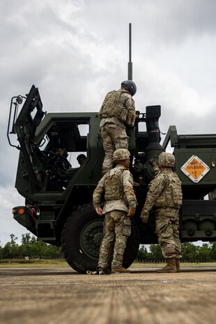U.S. Soldiers with 3rd Platoon, Alpha Battery, 1st Long Range Fires Battalion, 1st Multi-Domain Task Force conduct a High Mobility Rocket System Rapid Infiltration drill during Exercise Balikatan 24 at San Vicente Airport, Philippines, May 1, 2024. BK 24 is an annual exercise between the Armed Forces of the Philippines and the U.S. military designed to strengthen bilateral interoperability, capabilities, trust, and cooperation built over decades of shared experiences. (U.S. Marine Corps photo by Cpl. Kyle Chan)