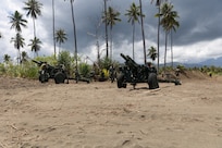 Philippine Marines conduct rehearsals with M101 105mm Howitzers prior to a live-fire training event during Exercise Balikatan 24 at Rizal, Luzon, Philippines, May 2, 2024. BK 24 is an annual exercise between the Armed Forces of the Philippines and the U.S. military designed to strengthen bilateral interoperability, capabilities, trust, and cooperation built over decades of shared experiences. (U.S. Marine Corps photo by Cpl. Kyle Chan)