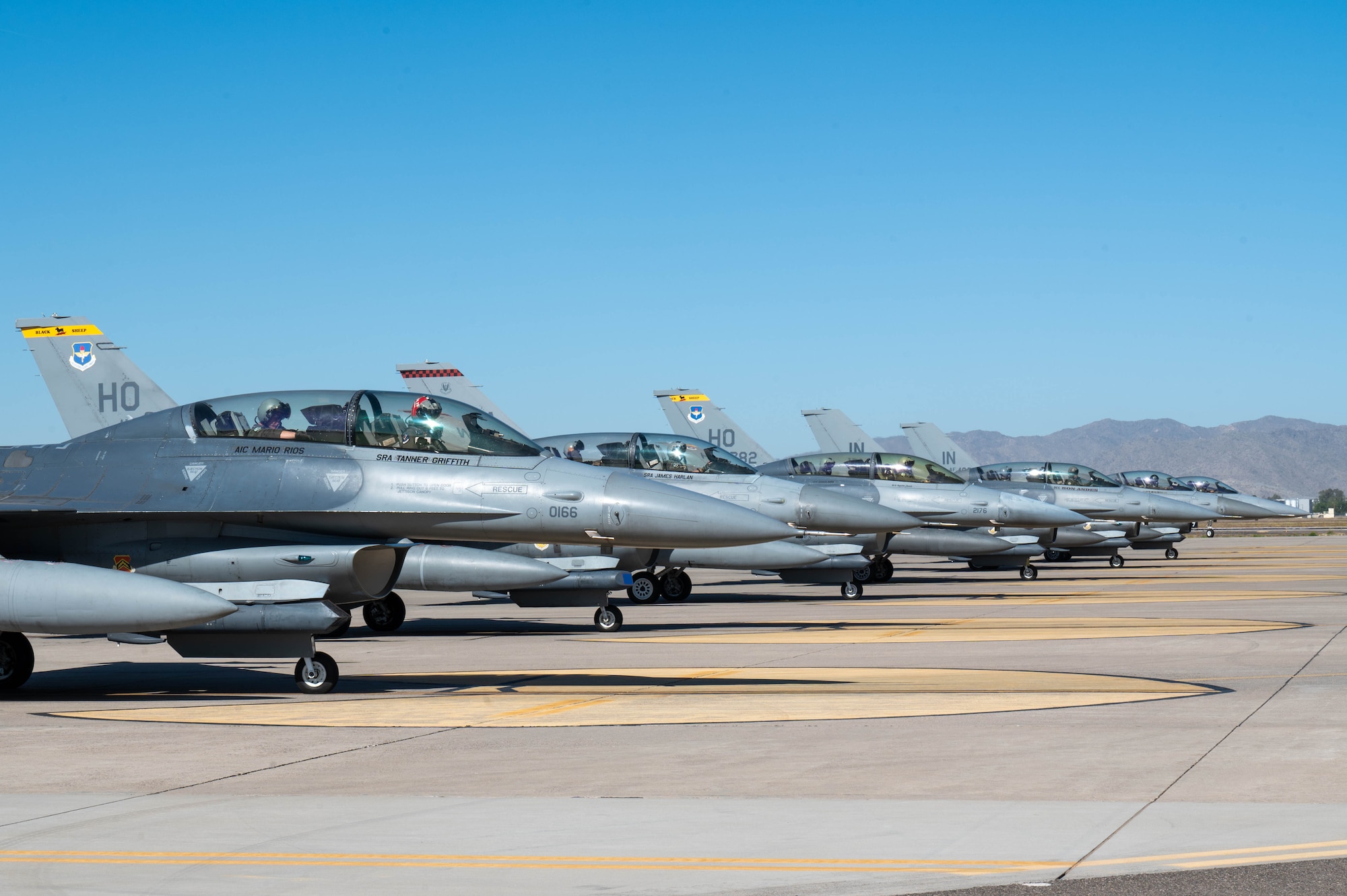 U.S. Air Force F-16 Fighting Falcon aircraft assigned to the 309th Fighter Squadron hold formation before takeoff, May 7, 2024, at Luke Air Force Base, Arizona.