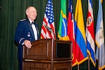 Col. Christopher Callis, Director of Plans, Requirements, Programs and Assessments Directorate from 12th Air Force, smiles during a speech at Joint Base San Antonio-Lackland Texas, April 24, 2024. Callis served as guest of honor for IAAFA’s Alpha-Cycle graduation banquet. Approximately 90 international military students from six partner nations and the U.S. Air Force graduated during the training cycle. IAAFA provides instruction in professional military education and leadership, aircrew training and technical courses – all in Spanish. (U.S. Air Force photo by Vanessa R. Adame)