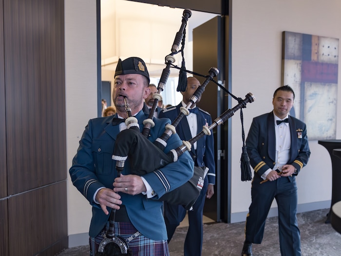 Man playing bag pipes