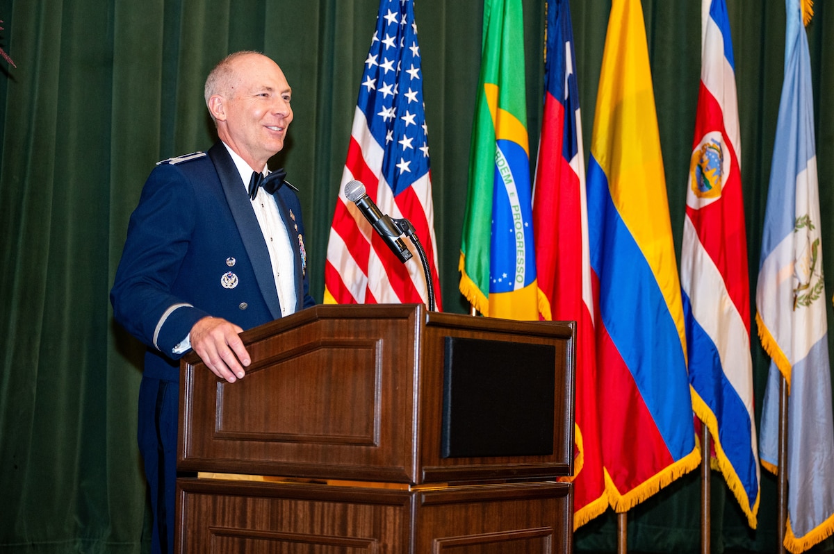 Col. Christopher Callis, Director of Plans, Requirements, Programs and Assessments Directorate from 12th Air Force, smiles during a speech at Joint Base San Antonio-Lackland Texas, April 24, 2024. Callis served as guest of honor for IAAFA’s Alpha-Cycle graduation banquet. Approximately 90 international military students from six partner nations and the U.S. Air Force graduated during the training cycle. IAAFA provides instruction in professional military education and leadership, aircrew training and technical courses – all in Spanish. (U.S. Air Force photo by Vanessa R. Adame)