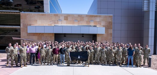  Participants of SPACE FLAG 24-1 pose for a group photo at Schriever Space Force Base, Colo., April 19, 2024. This event saw the participation of nearly 400 individuals focusing on space mission integration planning. (U.S. Space Force photo by Judi Tomich)