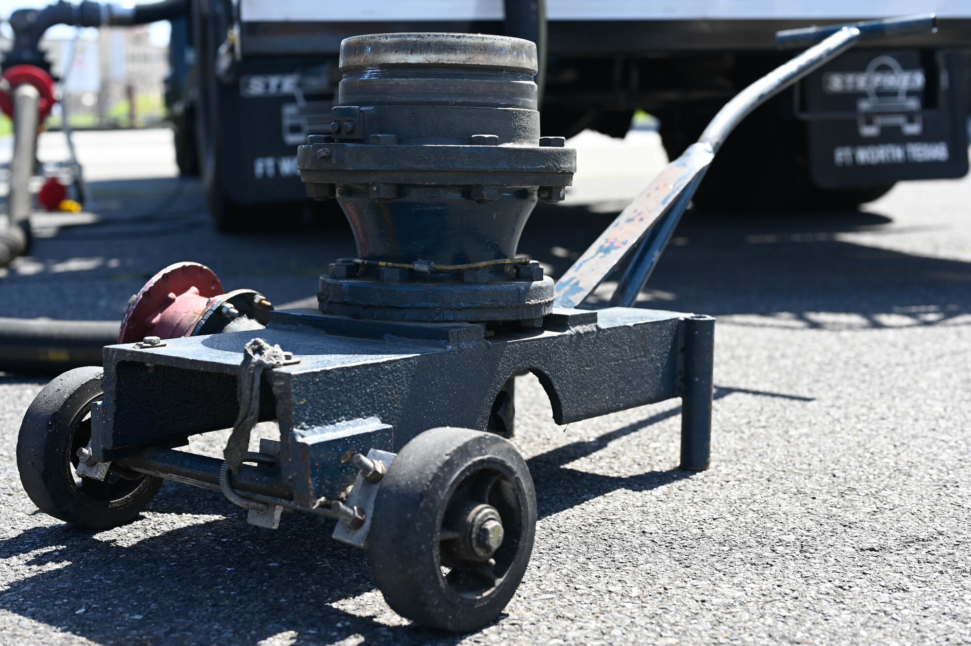 The original moosehead device sits on pavement.