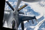 A U.S. F-16 Fighting Falcon approaches the boom of a 168th Wing KC-135 Stratotanker during Red Flag Alaska 24-1 aerial refueling operations over Alaska April 24, 2024. The 168th Wing provided air refueling during the exercise.