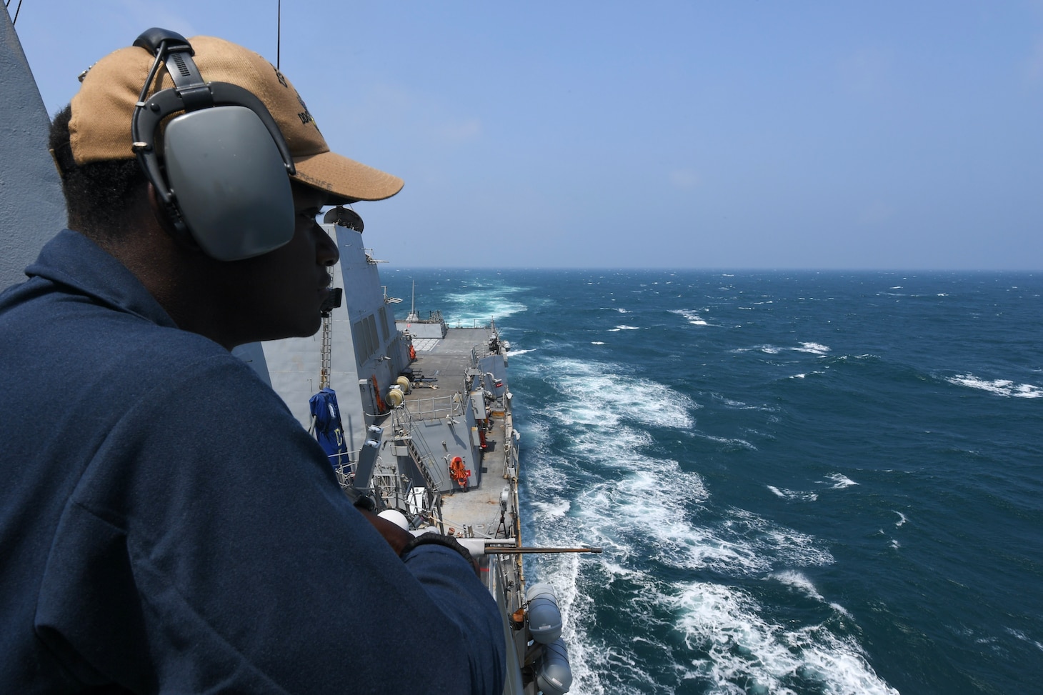 240508-N-IM467-1017
TAIWAN STRAIT (May 8, 2024) Seaman Gary Beckles, from Laurel, Maryland, stands port lookout aboard the Arleigh Burke-class guided-missile destroyer USS Halsey (DDG 97) during routine underway operations while transiting through the Taiwan Strait, May 8. Halsey is forward-deployed and assigned to Destroyer Squadron (DESRON) 15, the Navy’s largest DESRON and the U.S. 7th Fleet’s principal surface force. (U.S. Navy photo by Mass Communication Specialist 3rd class Ismael Martinez)