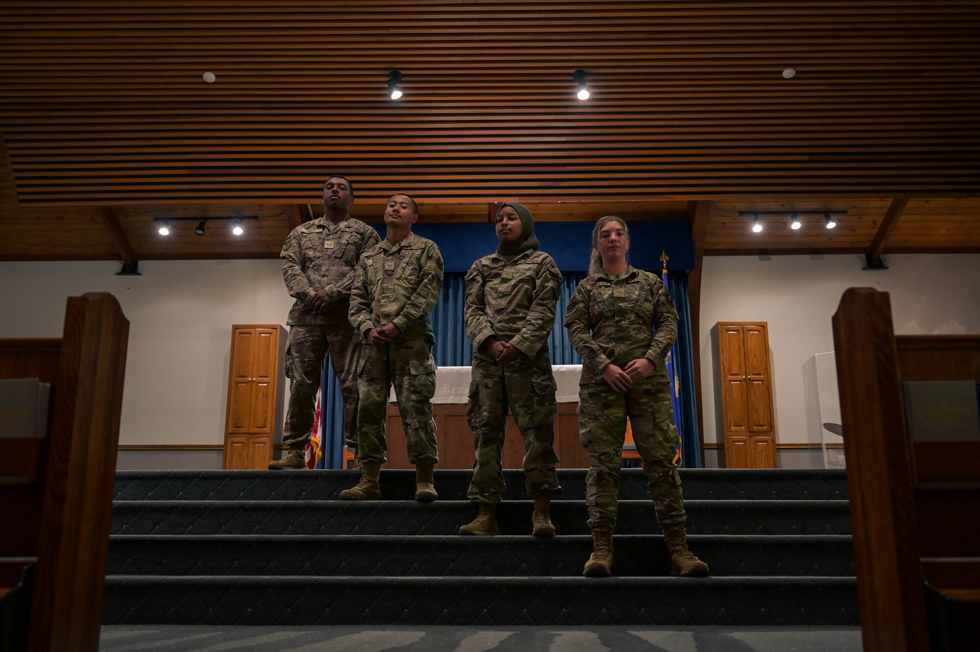 A group of 1st Special Operations Wing religious affairs Airmen, pose for a portrait in the Chapel at Hurlburt Field, Florida, April 16, 2024.