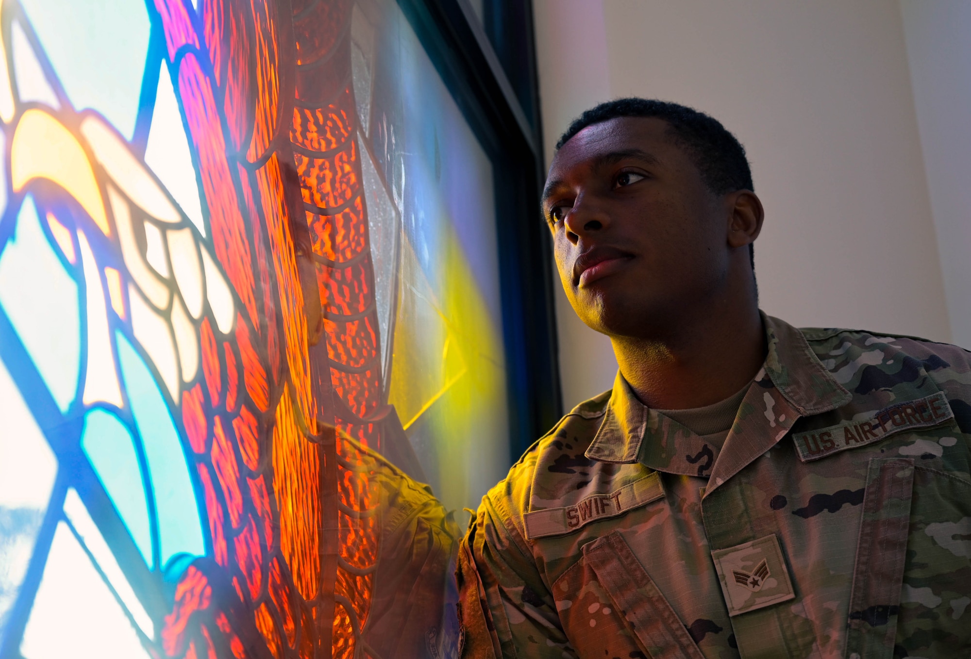 U.S. Air Force Senior Airman Roiel Swift, a 1st Special Operations Wing religious affairs Airman, poses for a portrait in front of the Operation Eagle Claw Memorial at Hurlburt Field, Florida, April 16, 2024.